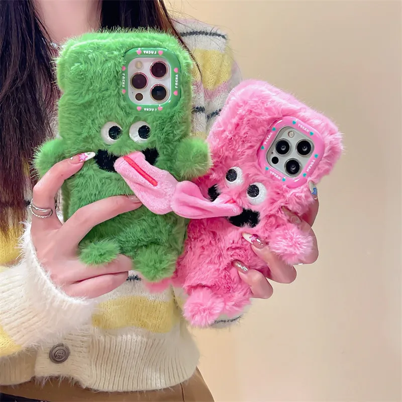 Soft plush phone case with green cartoon monster sticking tongue out, for iPhone.