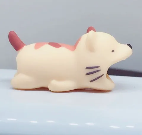 iPhone cable protector in an animal design, showing sleeve placed on charging cable near connector.