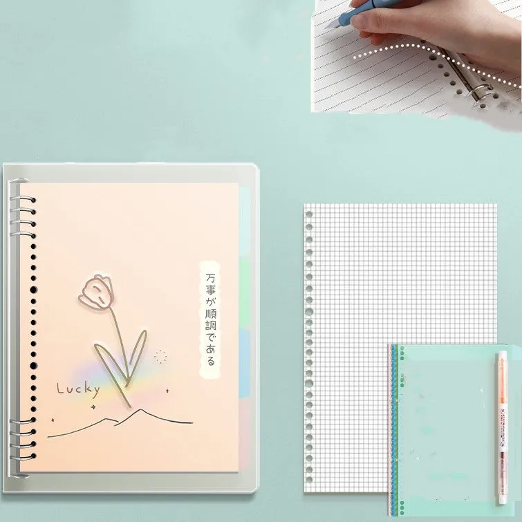B5 hardcover detachable notebook open showing colour pages and binding system