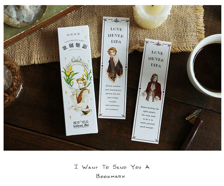 Pack of 30 white cardboard art bookmarks with designs including flowers and patterns, next to their plastic carton.