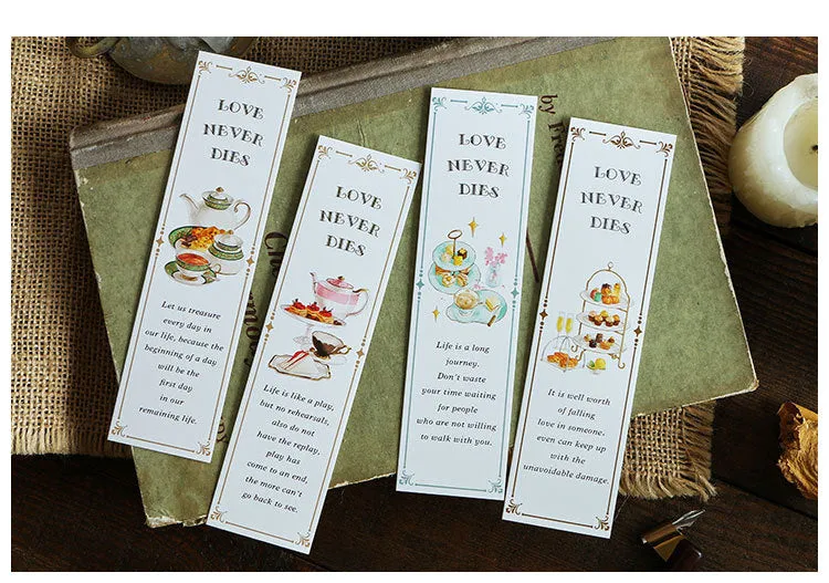 Pack of 30 white cardboard art bookmarks with designs including flowers and patterns, next to their plastic carton.