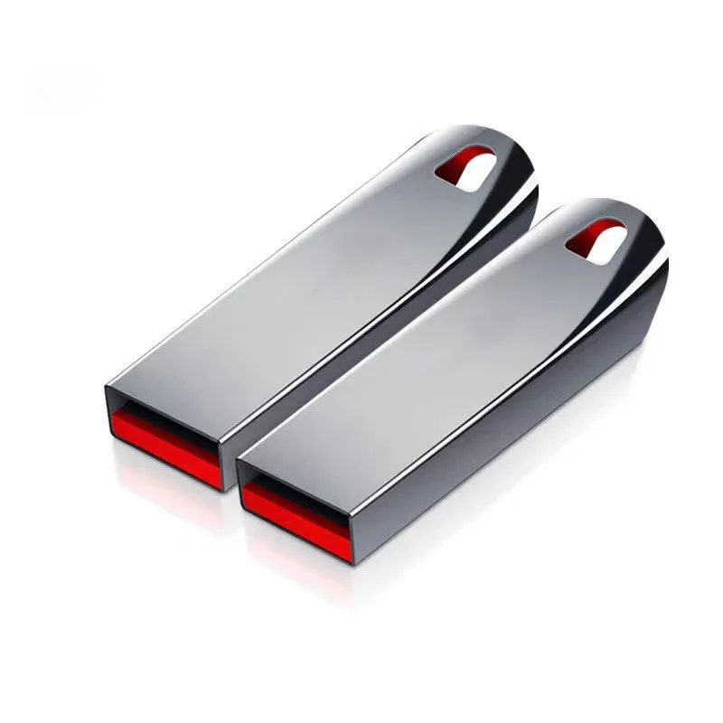 Silver metal USB flash drive with large capacity up to 2TB shown on a dark background