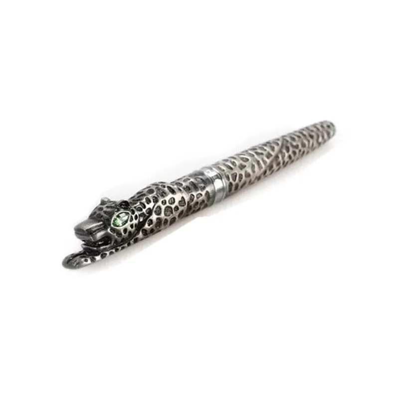 Embossed metal business pen in ancient silver or gold colour on a plain background.