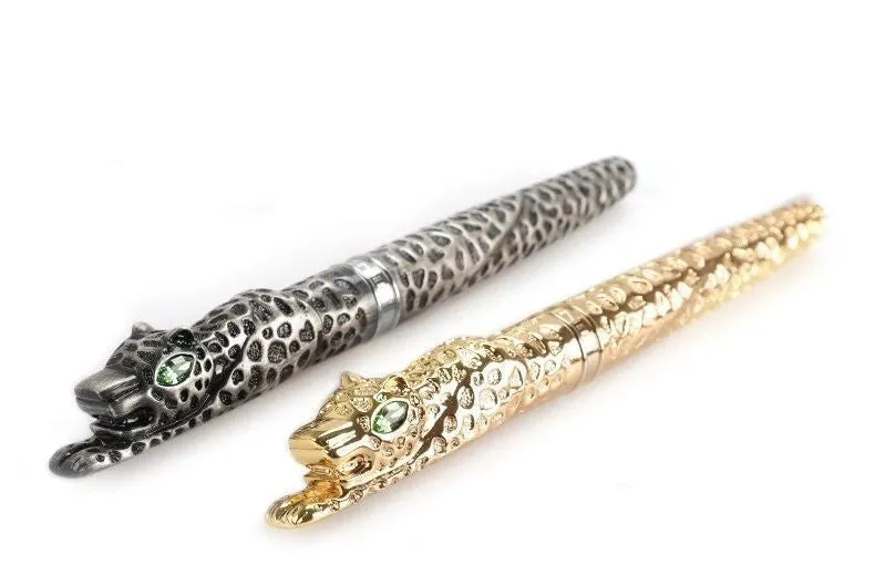 Embossed metal business pen in ancient silver or gold colour on a plain background.