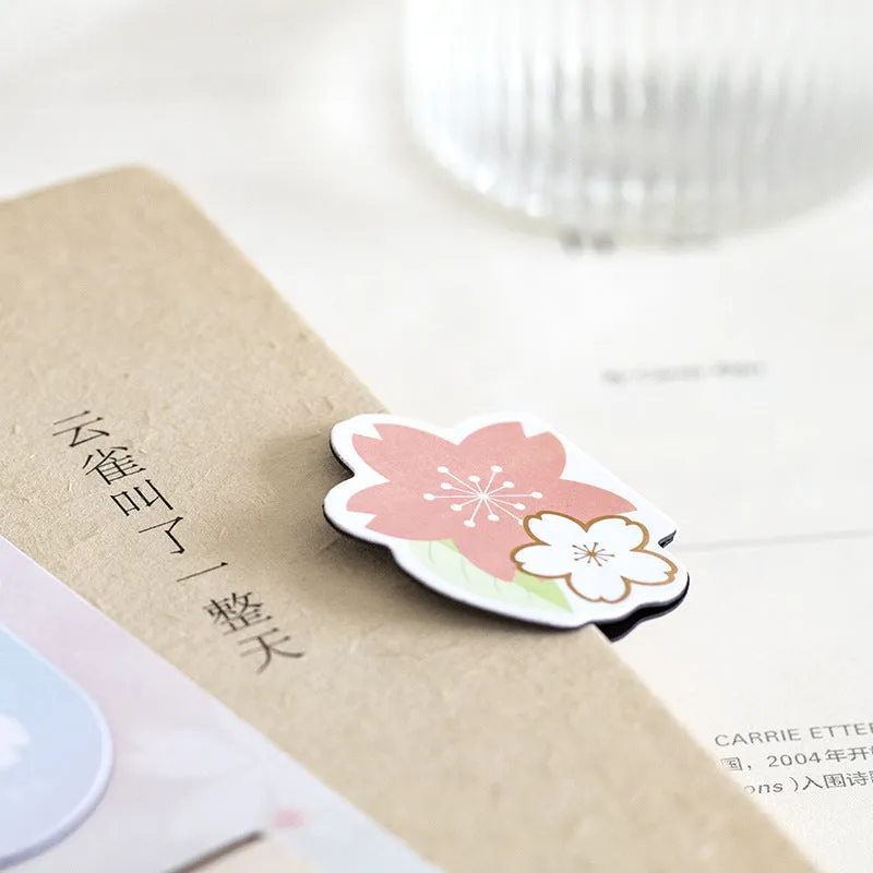 Set of four Yanji cherry blossom magnetic bookmarks showing different sakura designs.