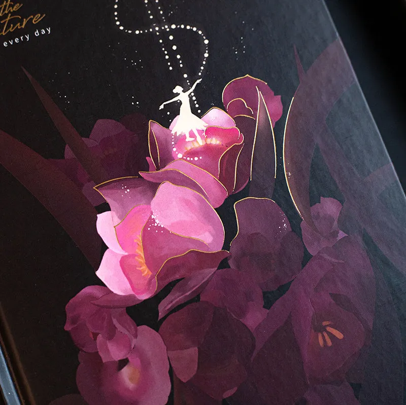 A5 notebook with luminous cover and silver foiling, open to show pages with colour illustrations.