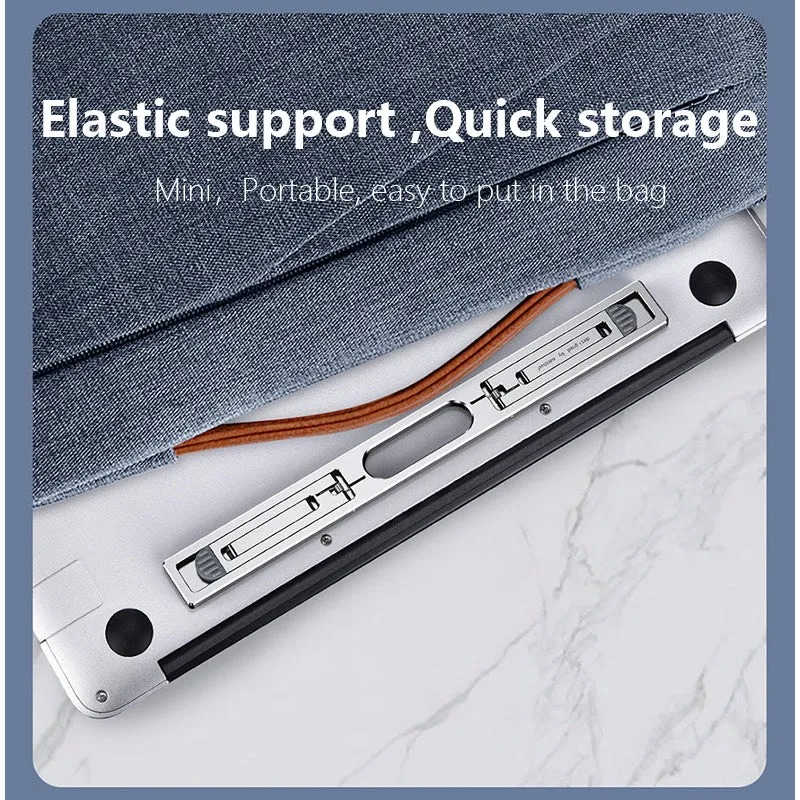 Aluminium adjustable laptop cooling bracket in silver or grey on desktop