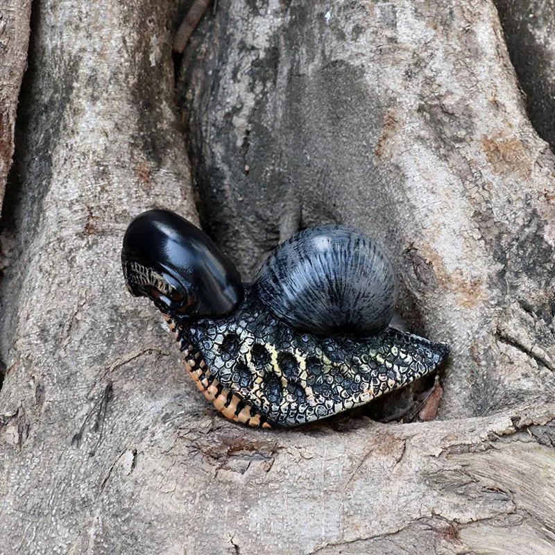 Modern simple resin sculpture of a snail character for garden or home decoration