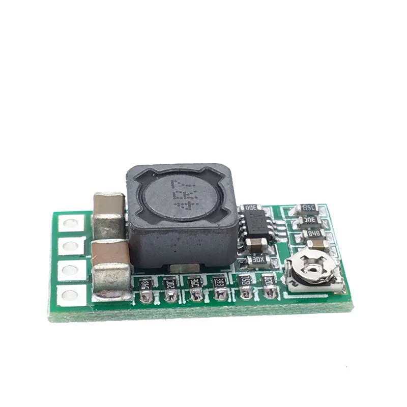 Green mini DC-DC buck converter module stepping 12-24V down to 5V 3A output.