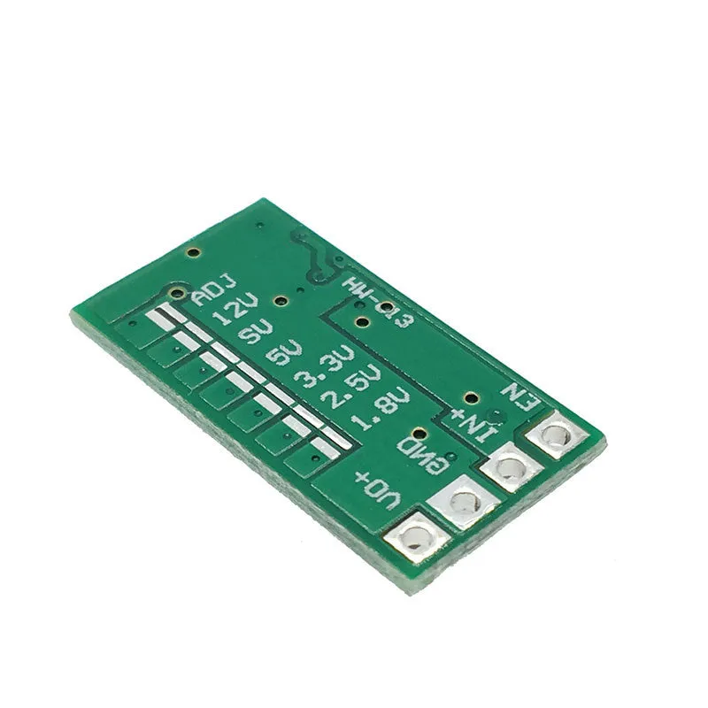 Green mini DC-DC buck converter module stepping 12-24V down to 5V 3A output.