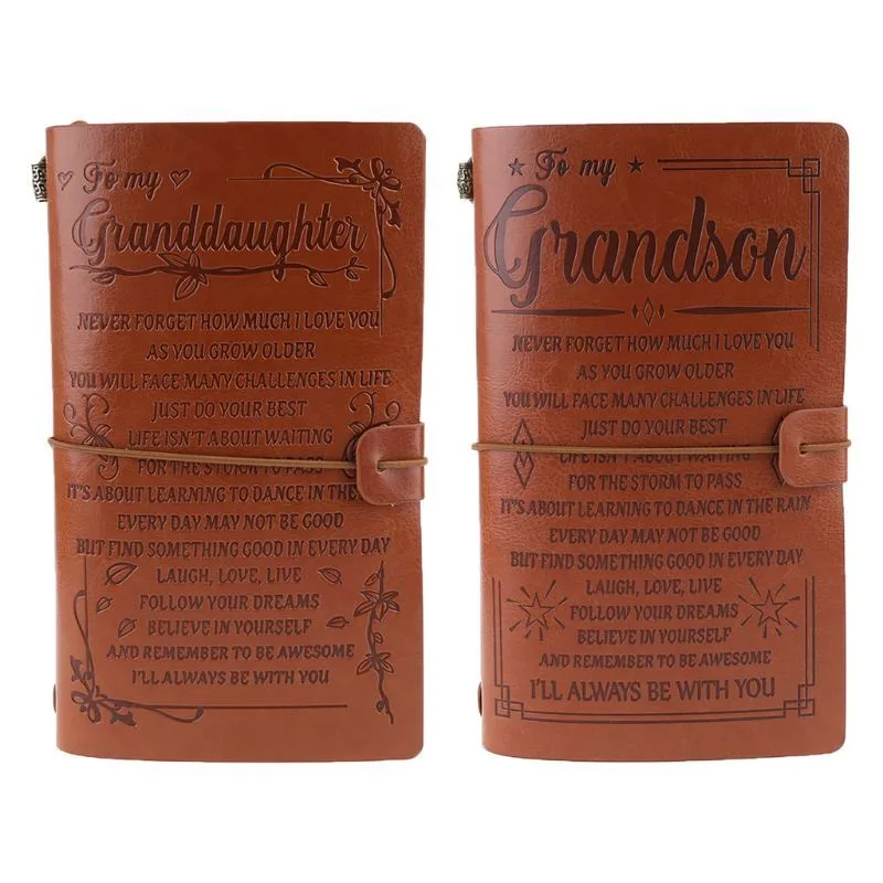 Leather hand ledger notebook with strap binding showing warm brown acid-free paper