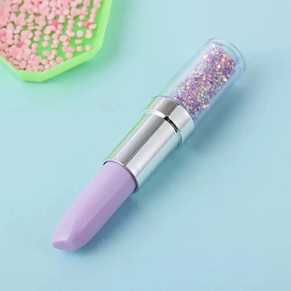 A plastic diamond painting point drill pen for manual diamond placement, shown in pink, purple, and green colour options.
