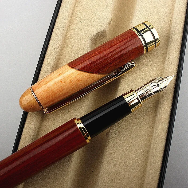 Wooden barrel and metal body pen with a grey fabric storage bag.