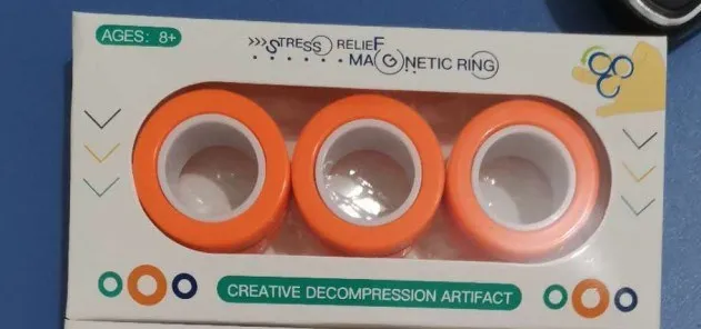 Magnetic finger rotating fidget ring in selected colour, showing external diameter of 3.2cm