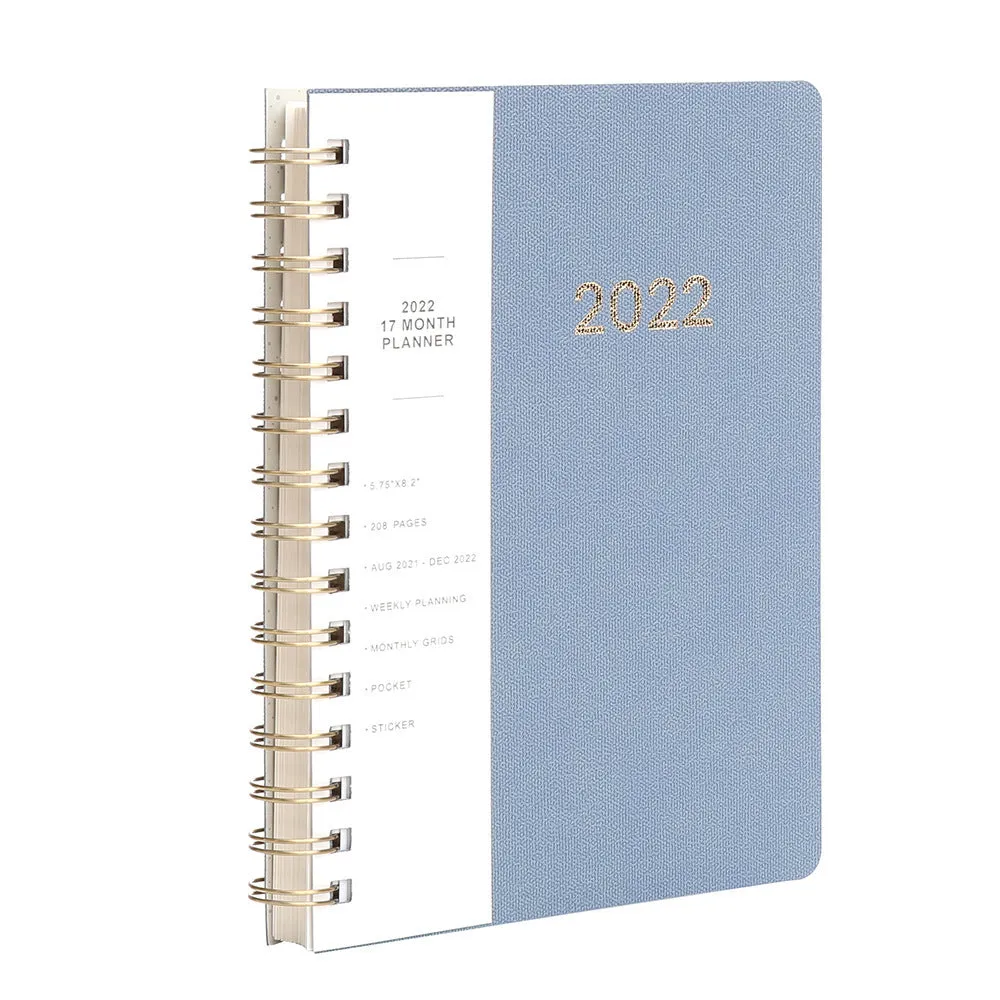 Green and blue 17-month 2022 student planner notebook with coil binding and pockets