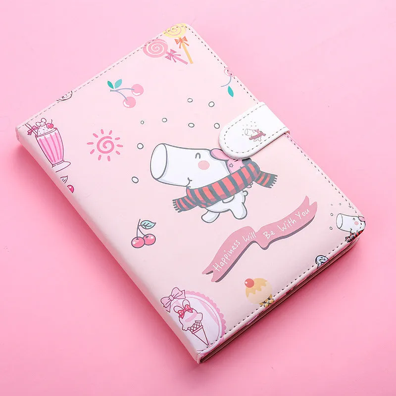 White Kaba Bear Hippo A6 notebook with magnetic buckle and heart design, showing size next to a pen.