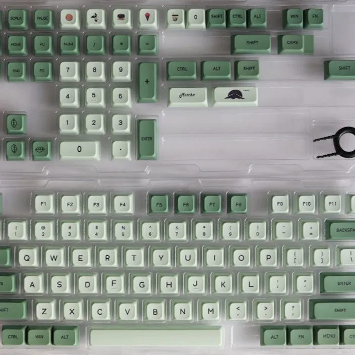 Set of 124 matcha green PBT keycaps with white legends for a mechanical keyboard