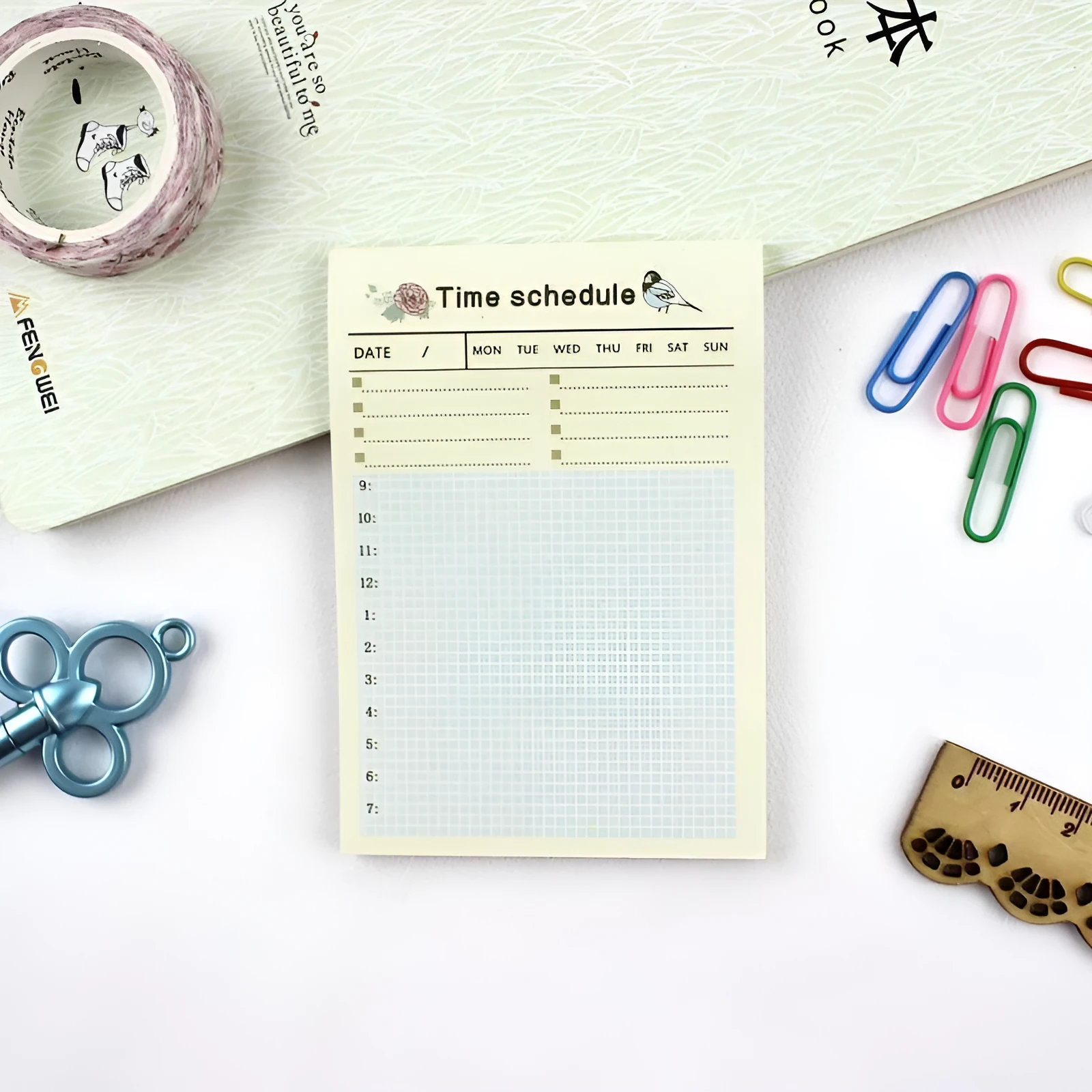 Weekly monthly work plan diary showing four design options in 10.2x7.2cm compact paper planner format