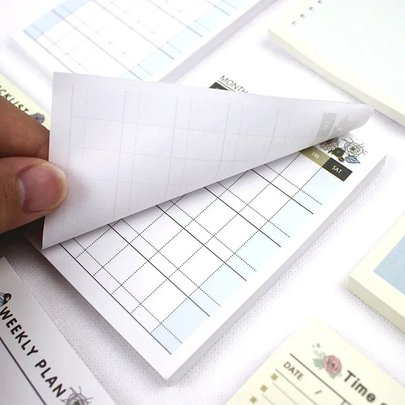 Weekly monthly work plan diary showing four design options in 10.2x7.2cm compact paper planner format