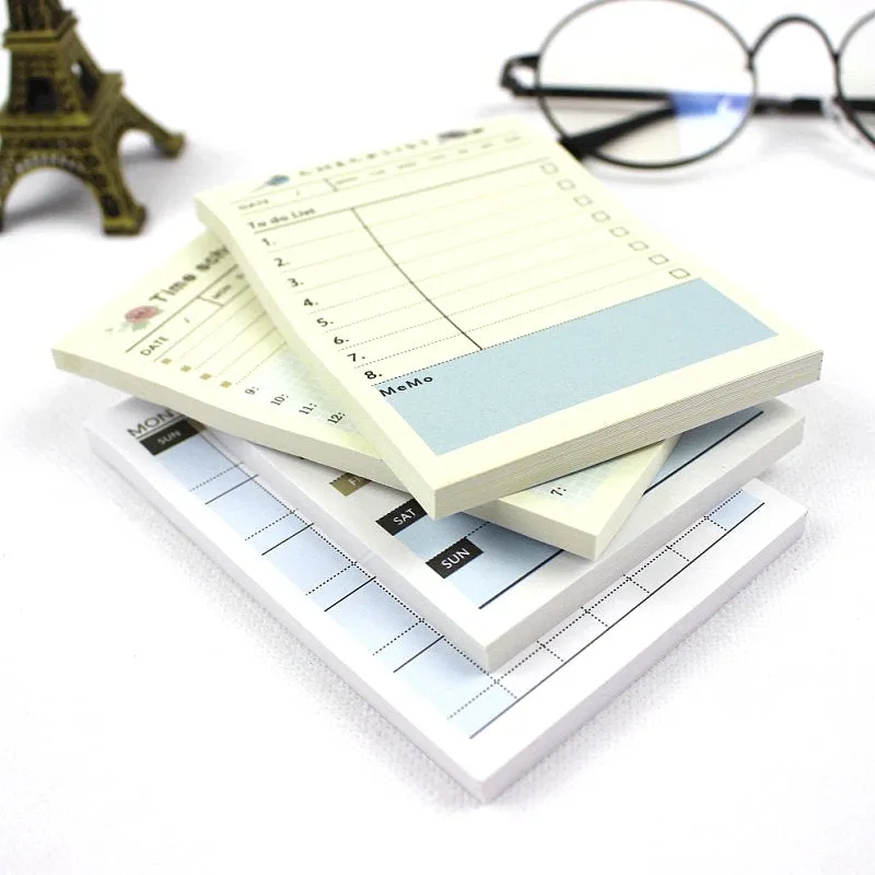 Weekly monthly work plan diary showing four design options in 10.2x7.2cm compact paper planner format