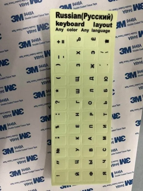 Yellow glowing PVC keyboard stickers with Arabic, Thai, Hebrew, French, Italian, and German language characters