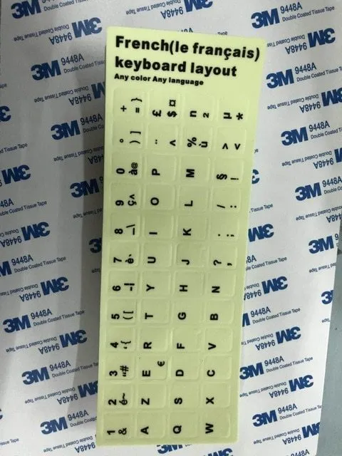 Yellow glowing PVC keyboard stickers with Arabic, Thai, Hebrew, French, Italian, and German language characters