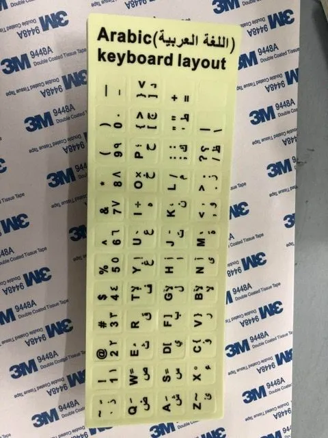 Yellow glowing PVC keyboard stickers with Arabic, Thai, Hebrew, French, Italian, and German language characters