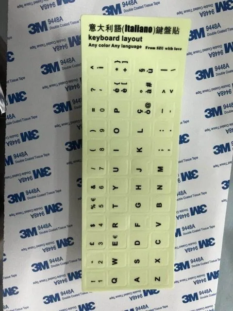 Yellow glowing PVC keyboard stickers with Arabic, Thai, Hebrew, French, Italian, and German language characters