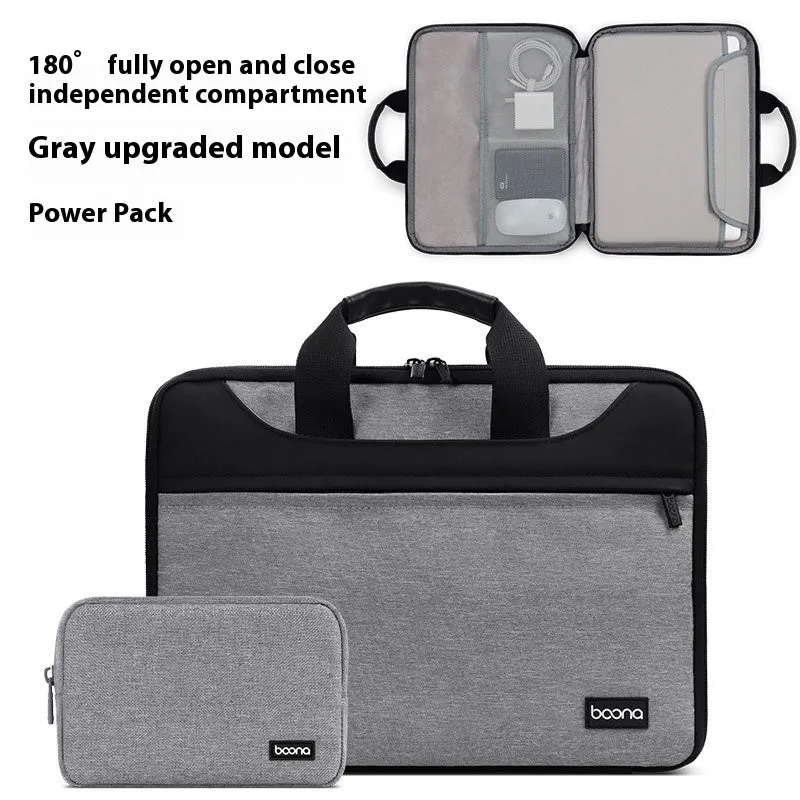 Black Oxford cloth laptop shoulder bag with soft carry handle for business travel.