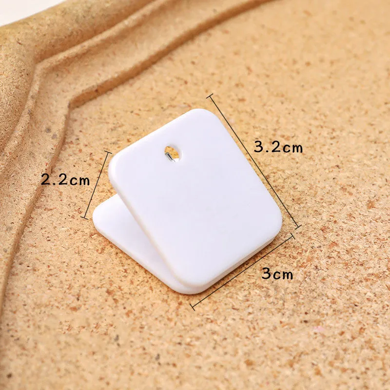 Square plastic photo note holder in black, white, or transparent colours measuring 3.2x3cm