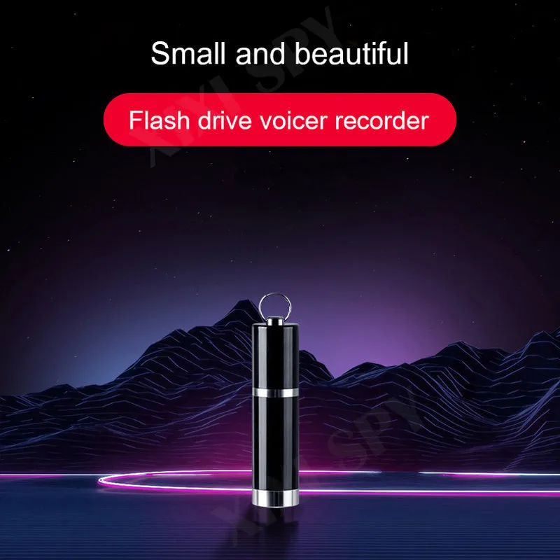 Black metal voice recorder with headset on a table
