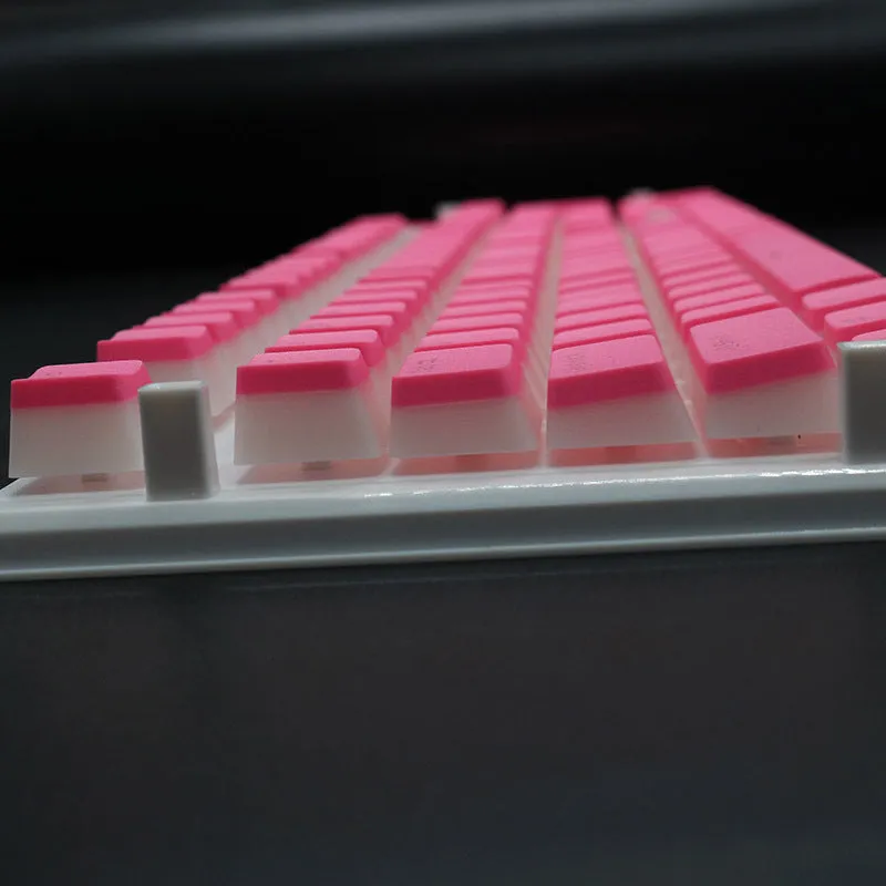 PBT pudding keycap set with translucent sides showing RGB lighting through 108 keys including UK ISO layout