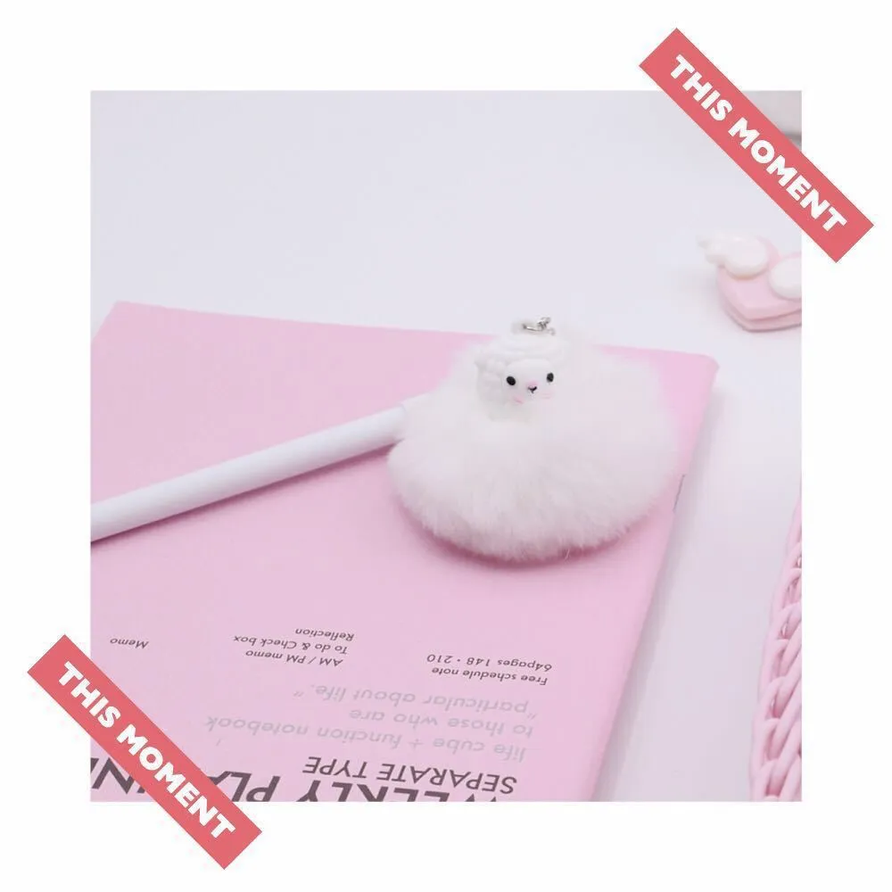 Alpaca hair ball pendant pen showing decorative pendant and 17cm length with 0.5mm tip