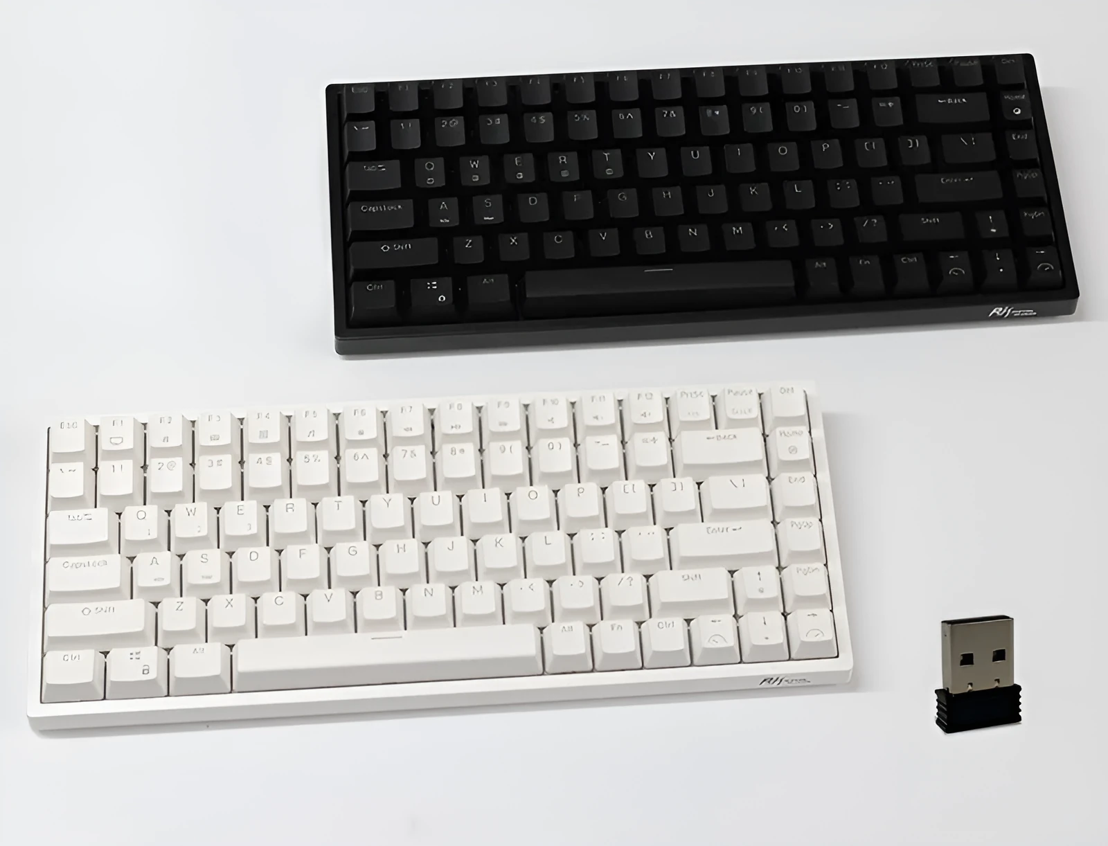 84-key three-mode mechanical keyboard with hot-swappable sockets in white or black case with white backlighting