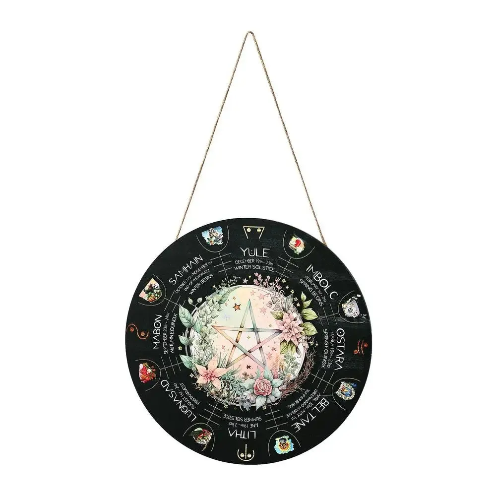 Boxwood decorative wooden pendant with choice of five carved disc designs on a neutral background.