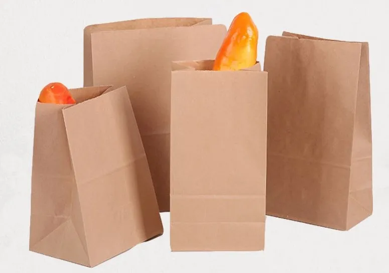Yellow kraft paper packaging bag with aluminium foil inner lining for snack foods