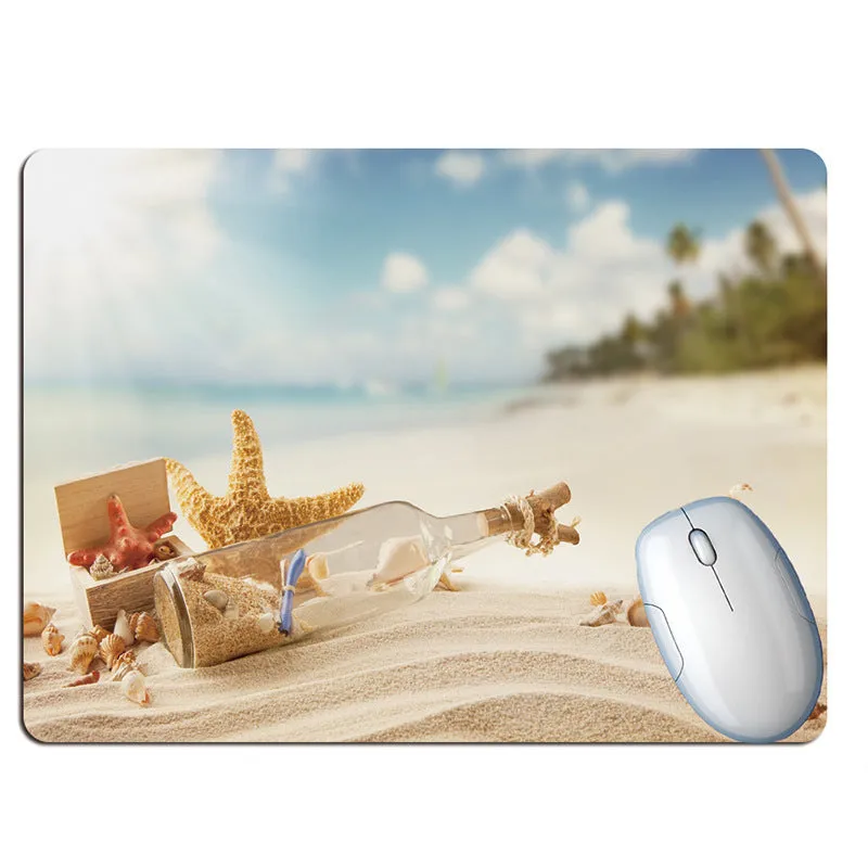 Wishing bottle summer beach holiday wind design rubber mouse pad on a desk.