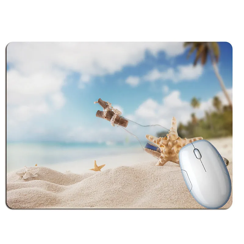 Wishing bottle summer beach holiday wind design rubber mouse pad on a desk.