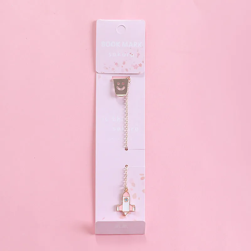 Alloy metal bookmark with cartoon pendant designs including panda, rocket and unicorn variations