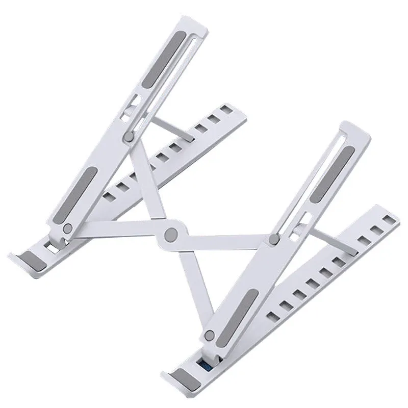 Black folding desktop bracket adjusted to a medium height angle on a wooden desk.