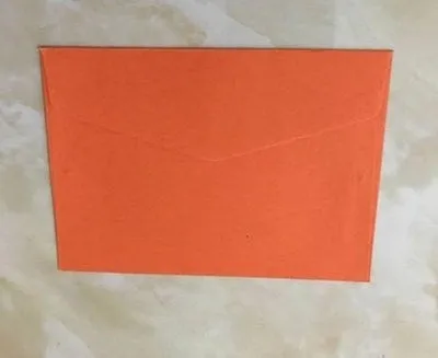 Pack of ten mini coloured paper envelopes in various shades, sized for business cards.