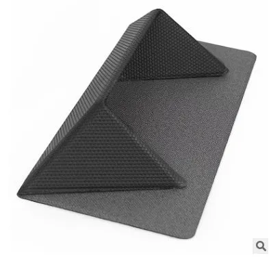 Blue foldable laptop cooling stand with non-slip surface shown open and closed, next to a 15-inch notebook.
