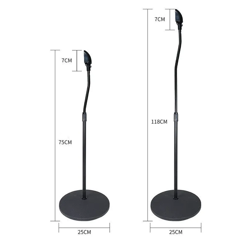 A black universal satellite speaker stand bracket on a shelf, next to an iPhone.