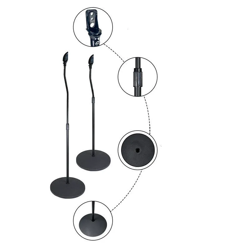 A black universal satellite speaker stand bracket on a shelf, next to an iPhone.