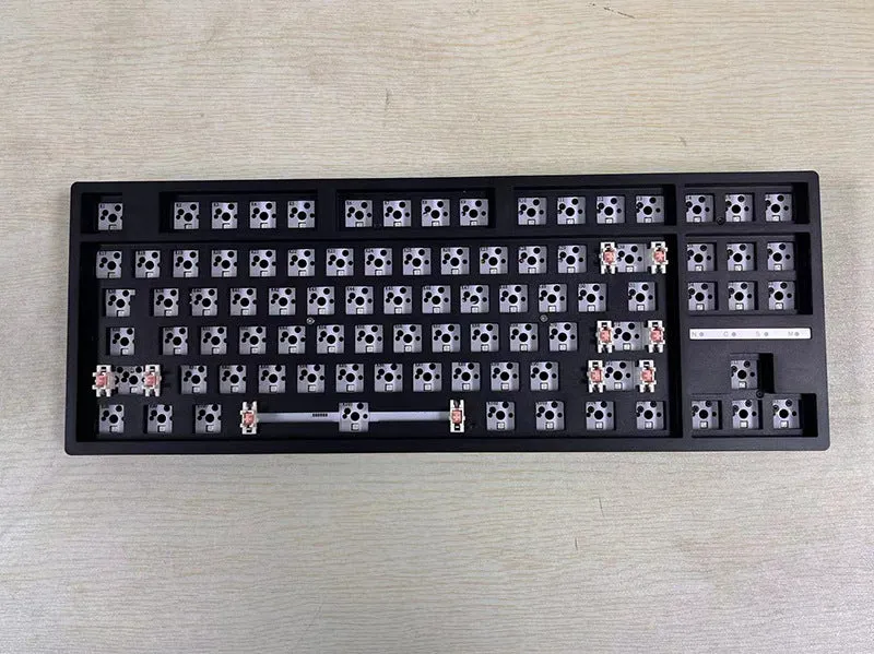 DIY hot-swappable mechanical keyboard kit with plastic case in multiple colour options