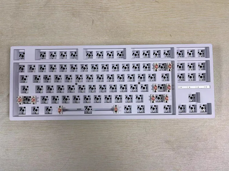 DIY hot-swappable mechanical keyboard kit with plastic case in multiple colour options