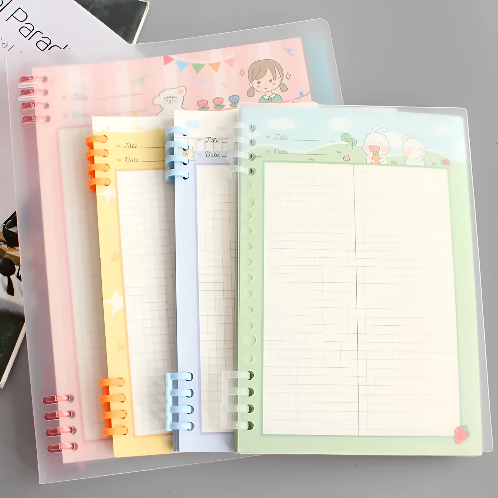 B5 refillable notebook with PP plastic shell in blue, green, pink, yellow, and transparent colours, showing 8-hole binder binding.