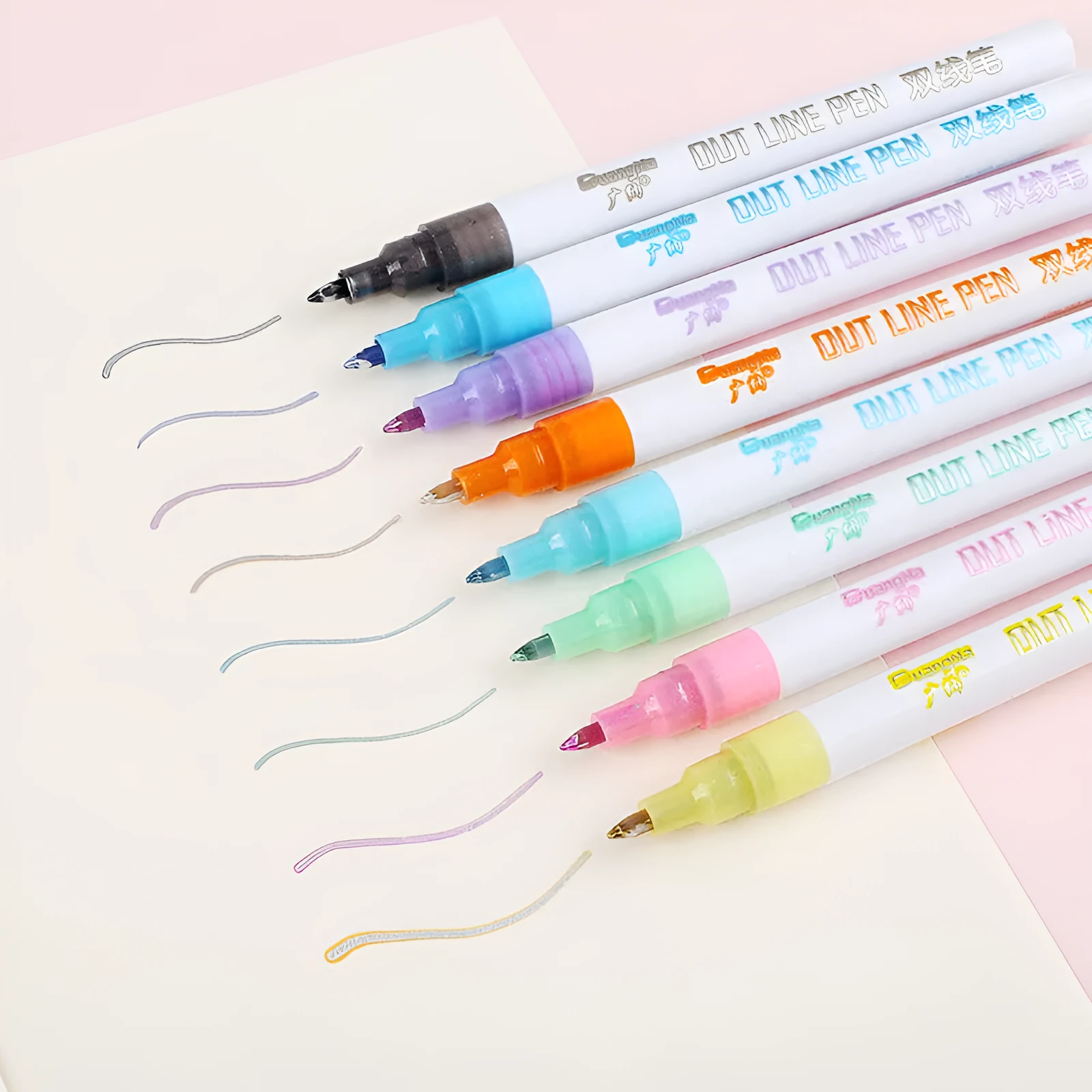 Set of eight fluorescent highlighter pens with 2mm chisel tips in a cardboard storage box.