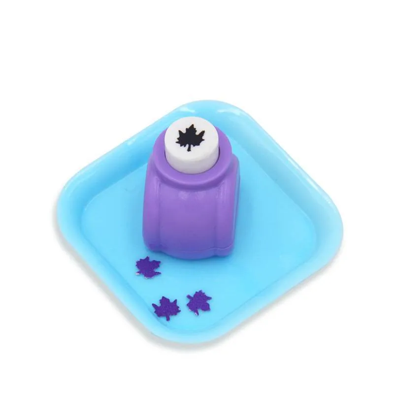 Children's plastic embossing craft kit with device and 20 embossing plates including heart, star, and elephant designs.