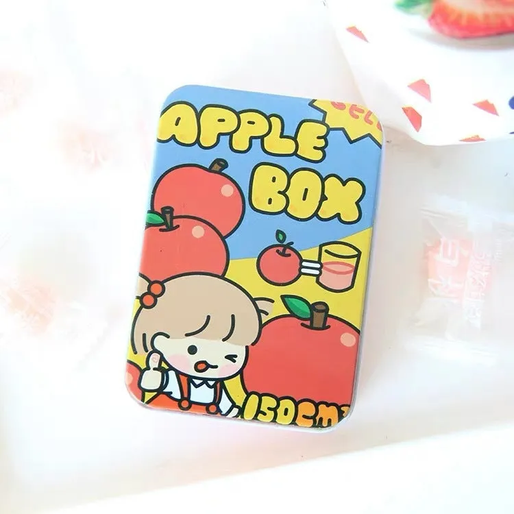 Small decorative iron storage tin box with a colourful printed lid, shown closed.